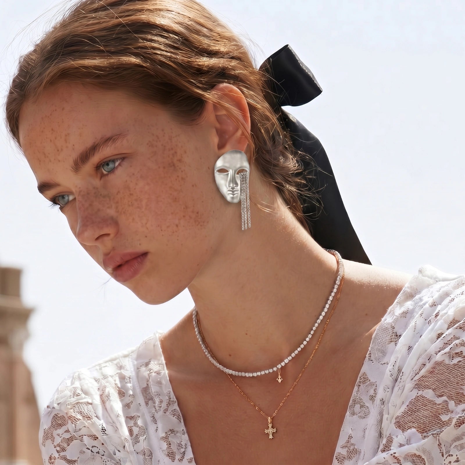 Boucles d'Oreilles Chaîne Visage Surréaliste